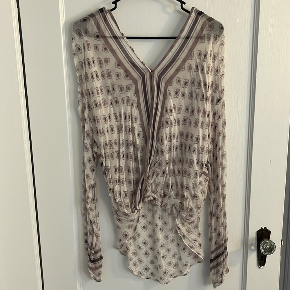 Flowy free people blouse with closure with clip in front